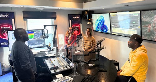 WDKX Host Tariq Spence, Center for Community Health & Prevention Communications Manager Becca Youmell, Infectious Diseases Specialist Brenda Tesini, and WDKX's DJ Sight.