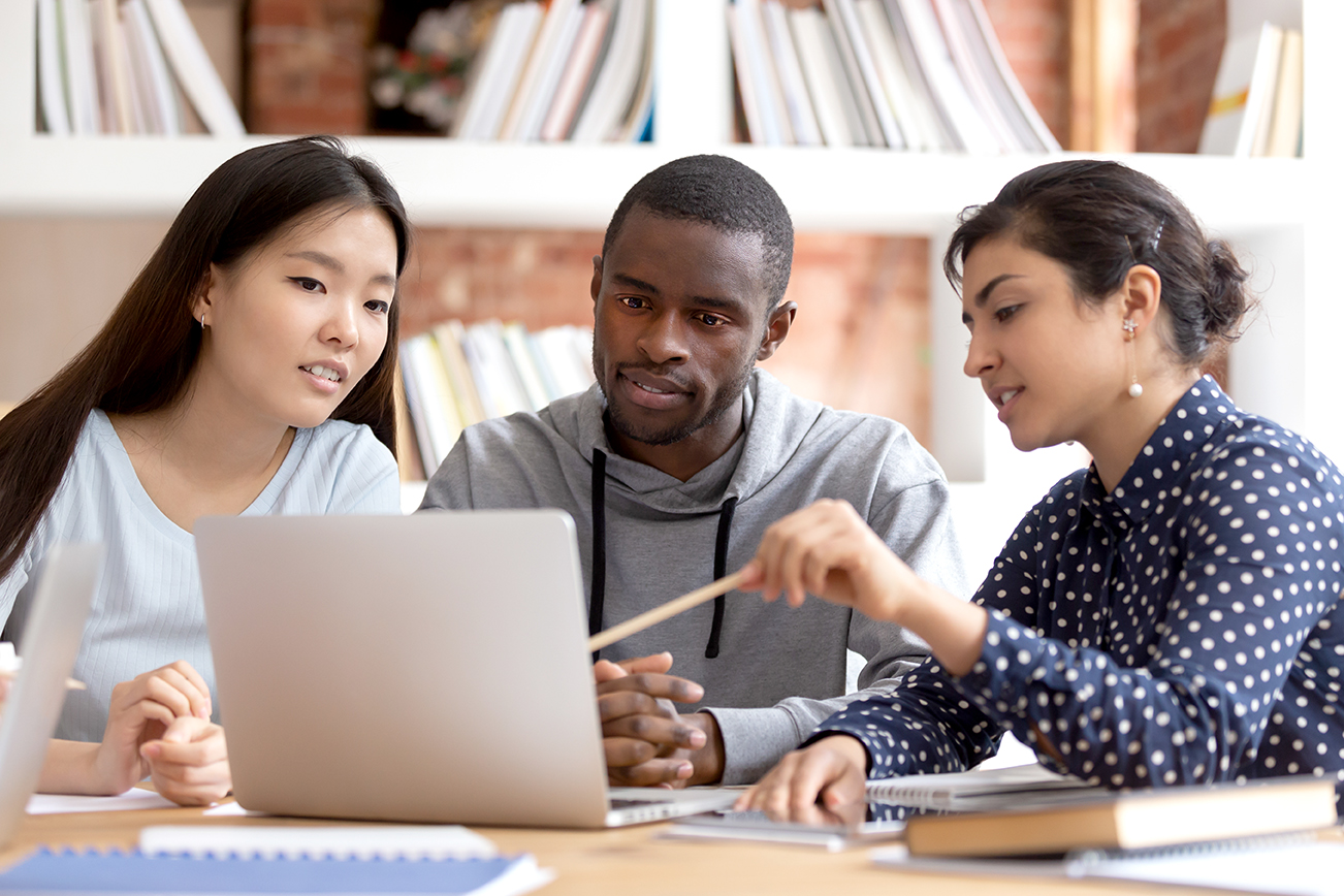 group looking at computer