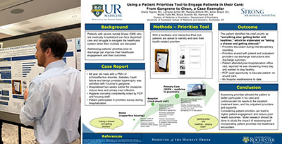 Researcher presenting poster