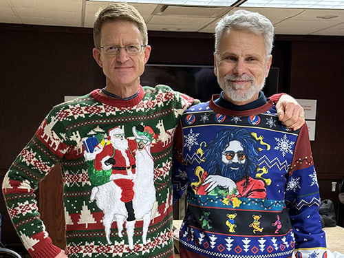 Pulmonary team model ugly holiday sweaters